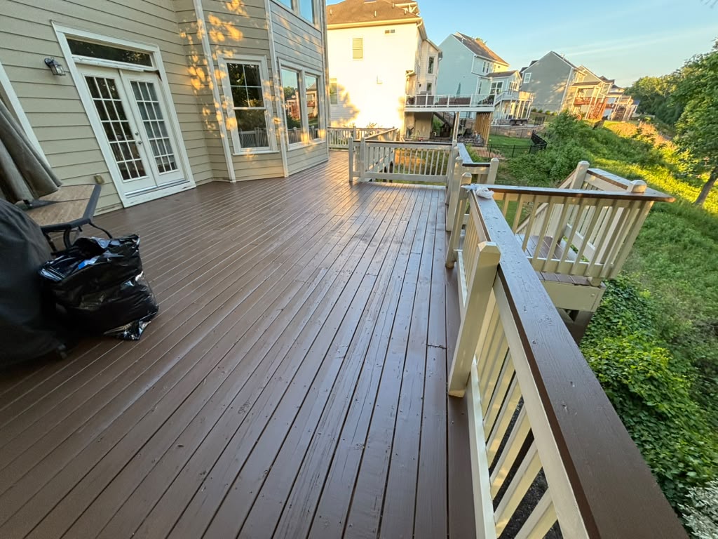Deck after: new composite boards and rail by B&T