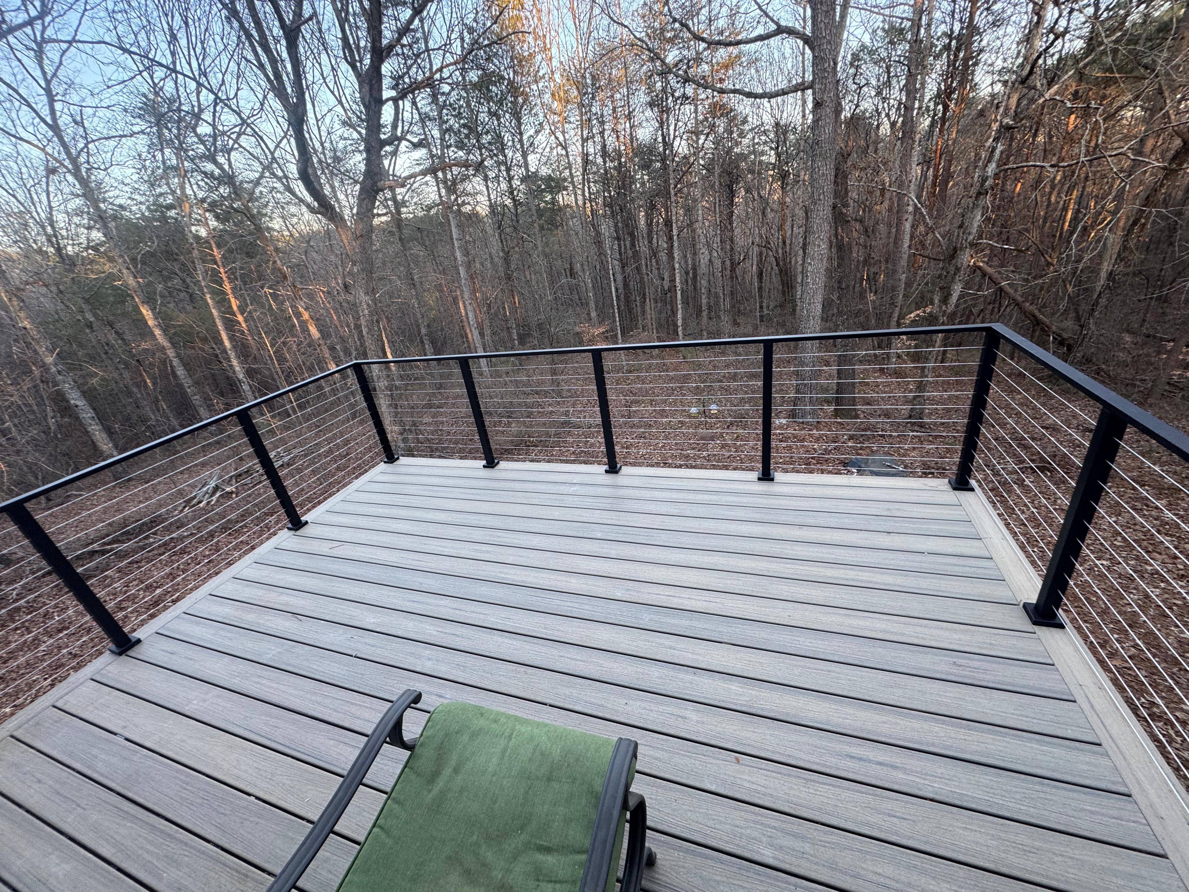 Deck with cable railing at dusk